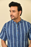 Mandarine collar half sleeves shirt in natural Bagru print with wooden buttons.