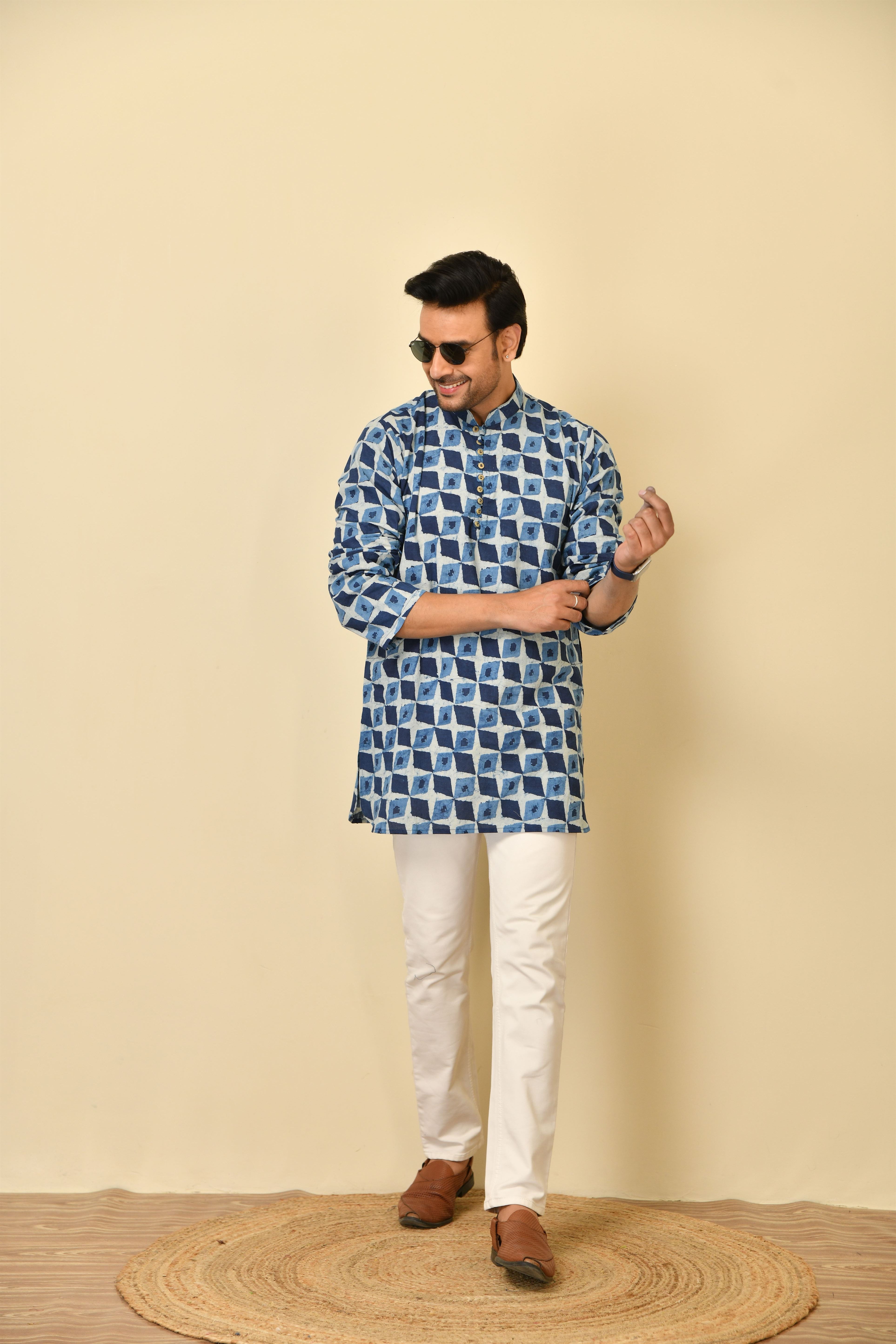 Mandarin collar short kurta in natural Bagru print with wooden buttons.
