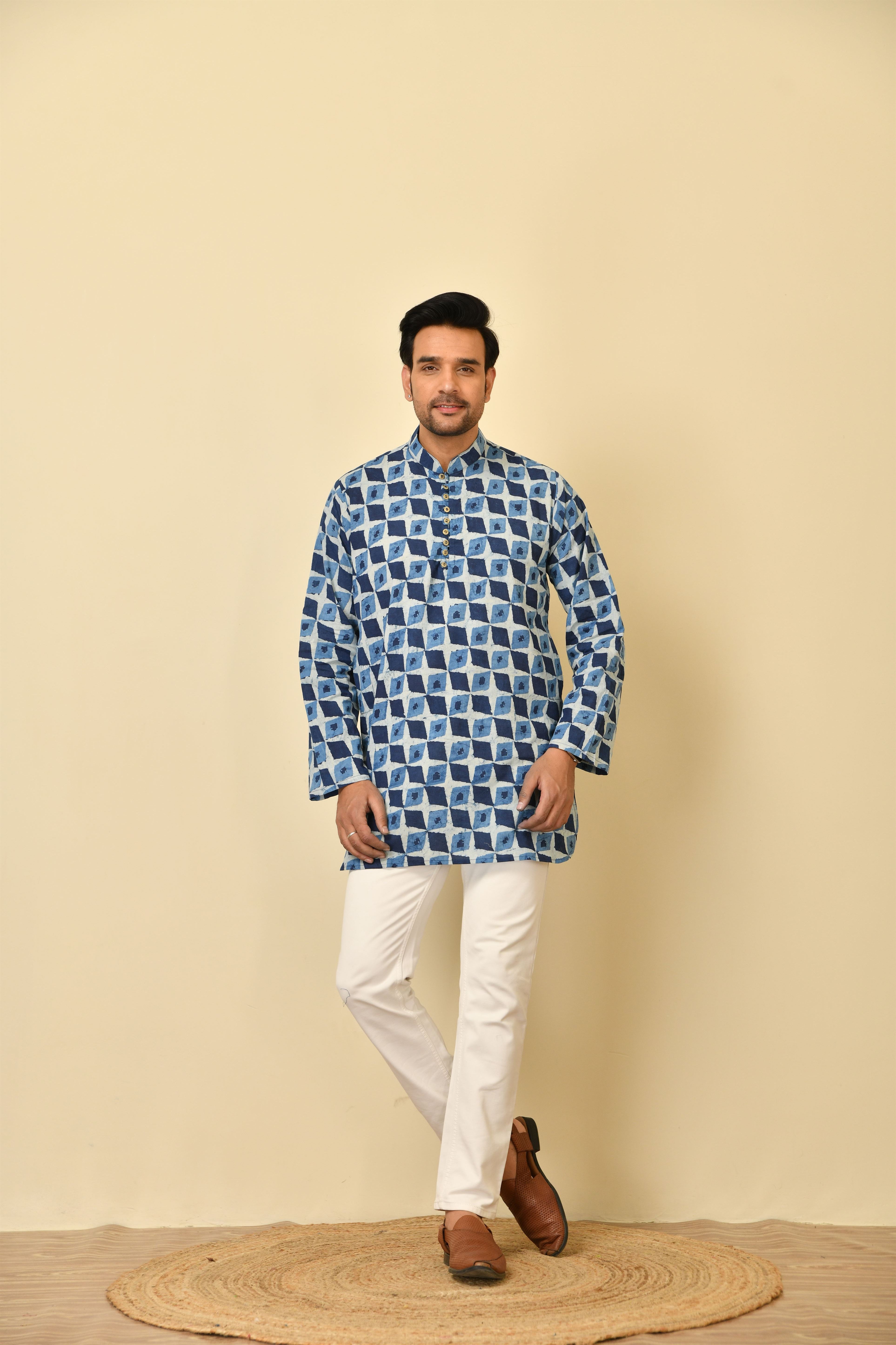 Mandarin collar short kurta in natural Bagru print with wooden buttons.