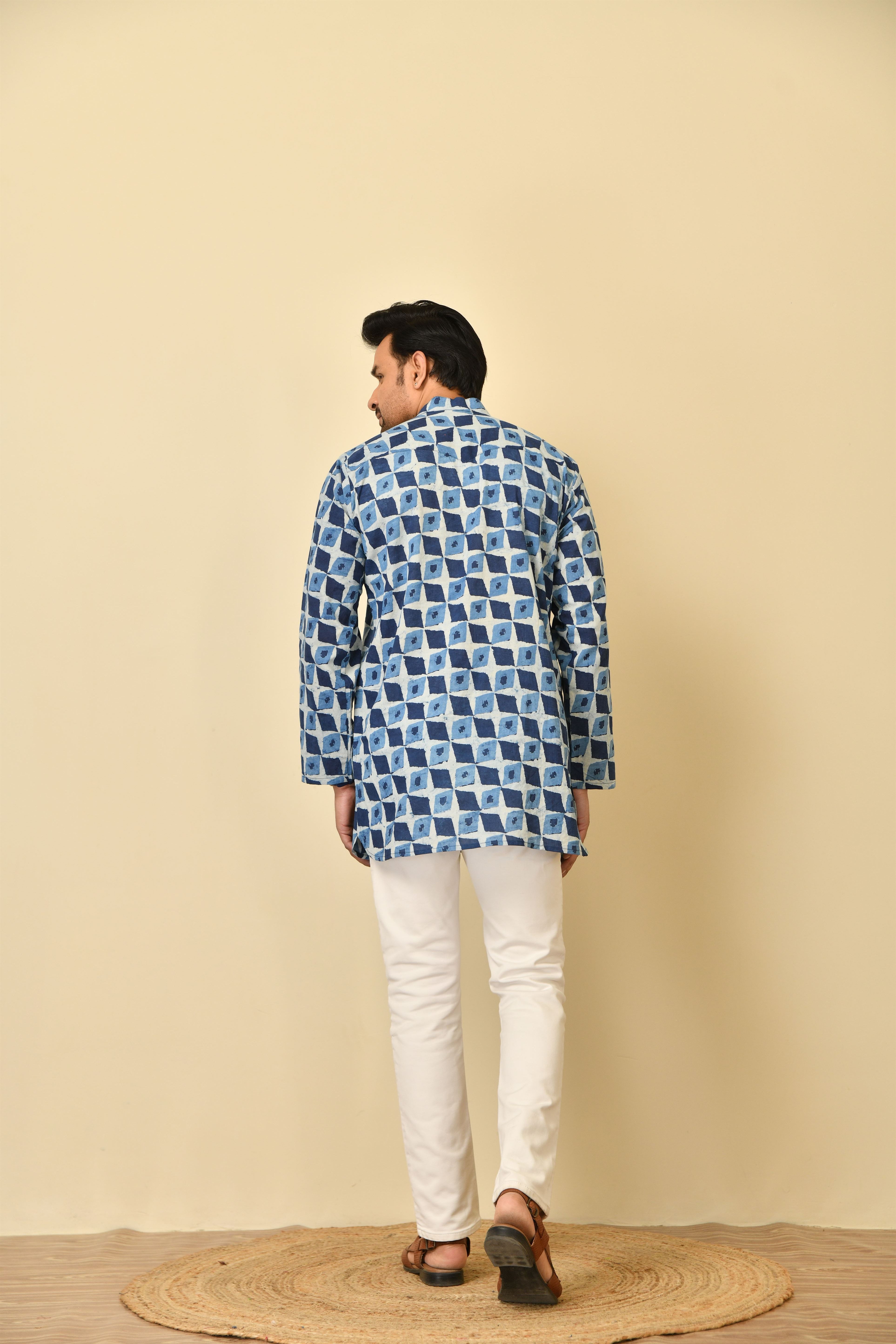 Mandarin collar short kurta in natural Bagru print with wooden buttons.