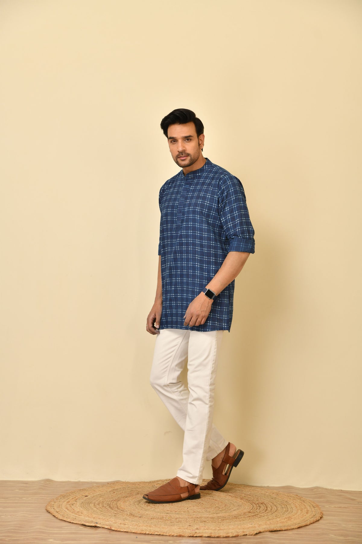 Mandarine collar short kurta in natural Bagru print with wooden buttons.
