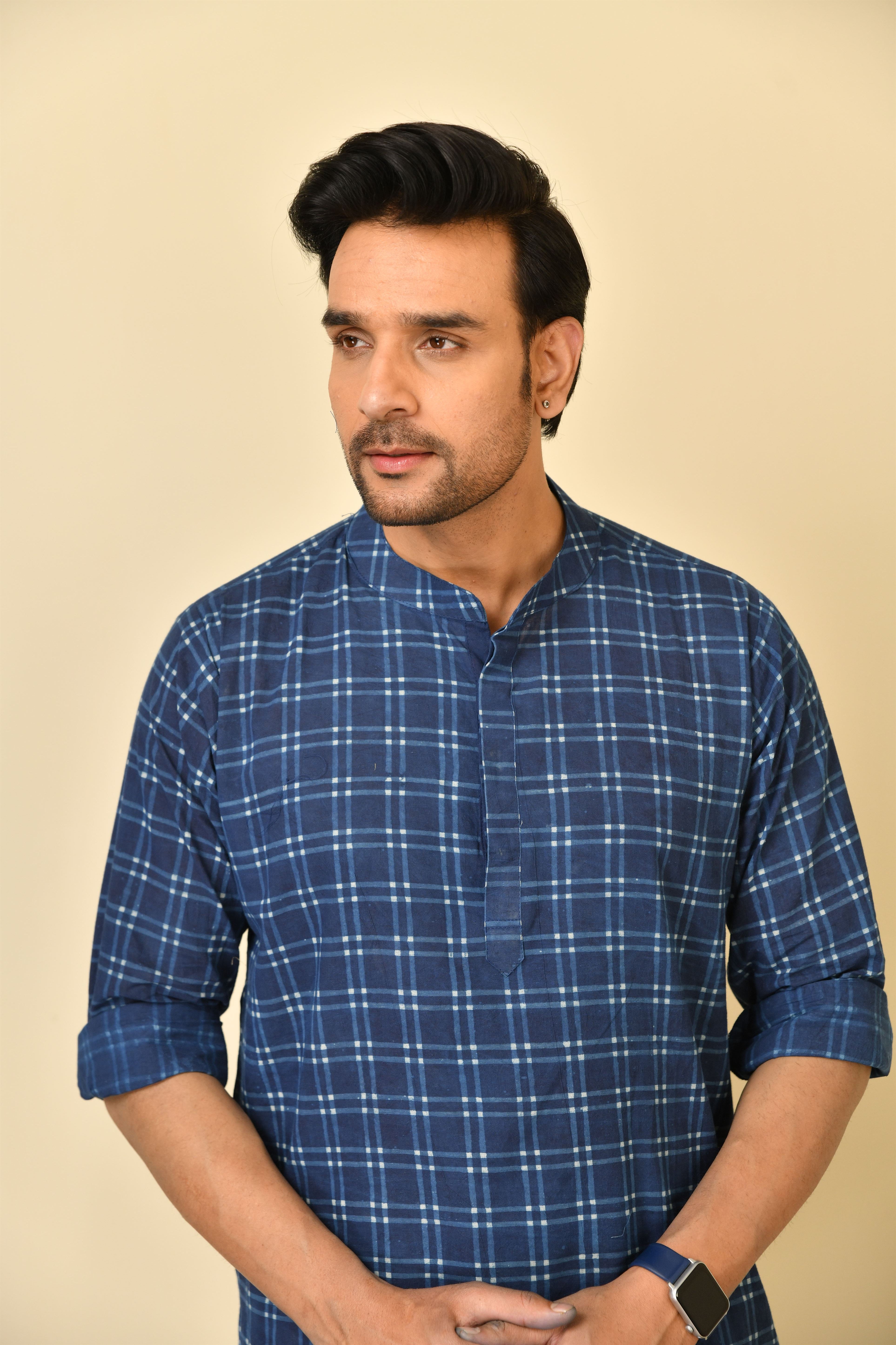 Mandarine collar short kurta in natural Bagru print with wooden buttons.