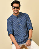 Mandarin collar full sleeves shirt in natural Bagru print with welt pocket and wooden buttons.