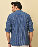 Mandarin collar full sleeves shirt in natural Bagru print with welt pocket and wooden buttons.