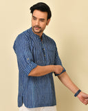 Mandarin collar full sleeves shirt in natural Bagru print with welt pocket and wooden buttons.